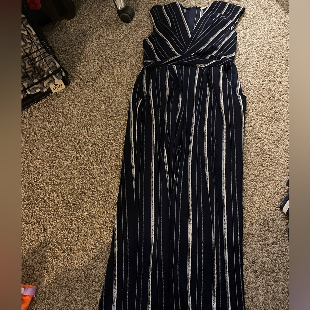 Women’s and girl’s Navy blue and white striped sleeveless pantsuit.